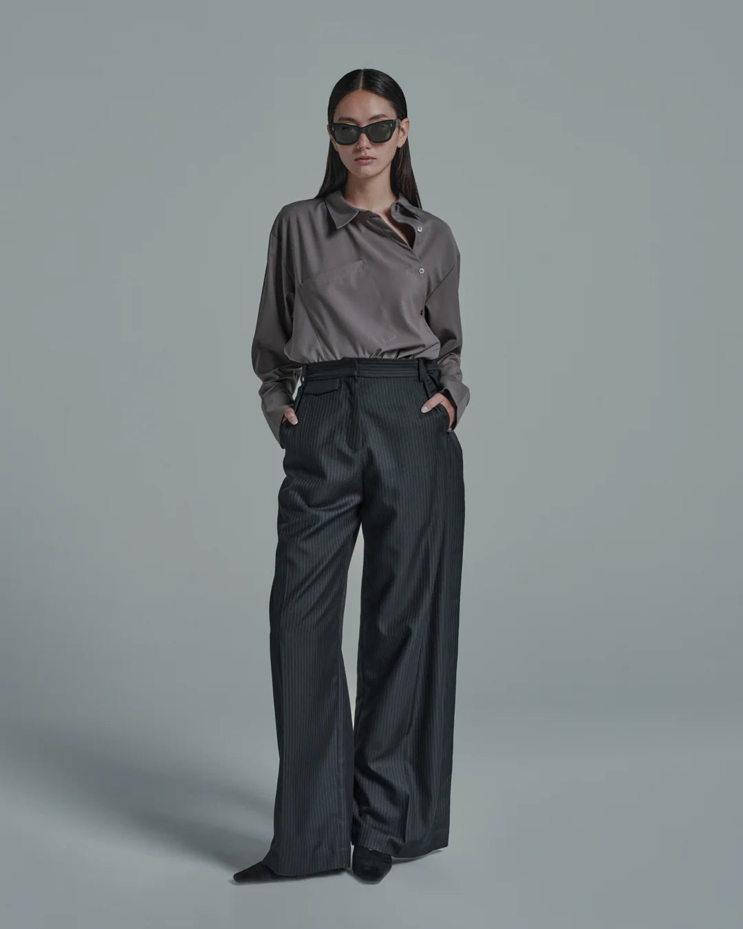 เสื้อเชิ้ตดีไซน์ไม่สมมาตร (Asymmetrical Shirt)